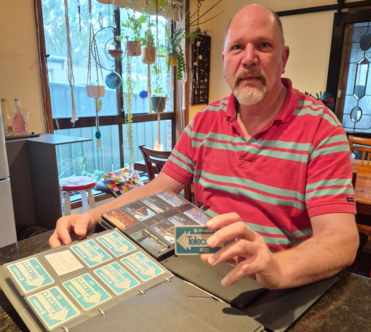Eric Schuenemann, collector, researcher and founder of the Phonecard Museum, with his GEC Plessey GPT phonecards