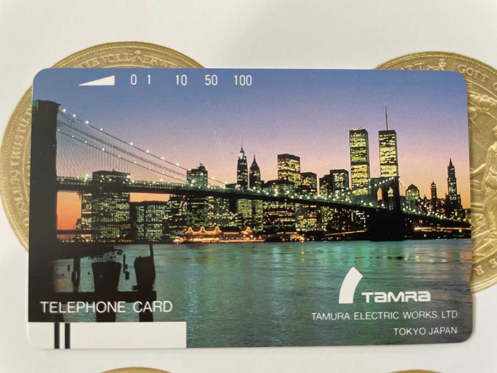 Tamura trial phonecard showing the New York skyline, identified by Yang Xiaodong