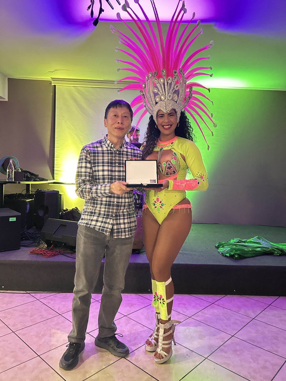 Yang Xiaodong receives his commemorative plaque during the PIM 2026 collectors' dinner in Turin
