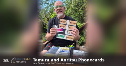 Eric Schuenemann, founder of the Phonecard Museum, holding a page of Anritsu SAMPLE phonecards – cover image for the Tamura and Anritsu research article